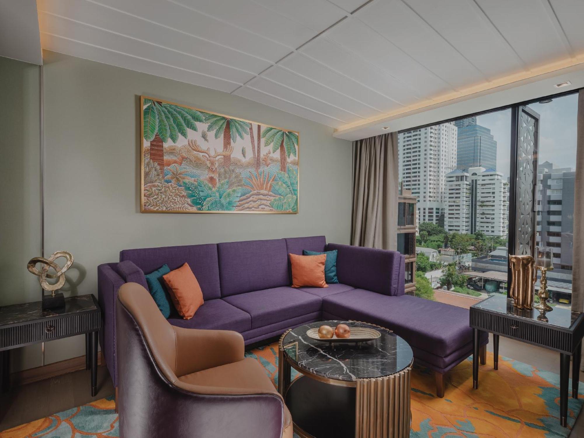 Nysa Hotel Bangkok Sukhumvit 11 Exterior foto Living room of a suite